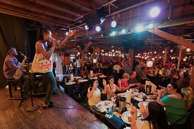 All You Can Eat BBQ Dinner and Show at Tropical Isle with Sightseeing Cruise - The One-Hour New River Cruise That Puts Millionaire Homes on the Map