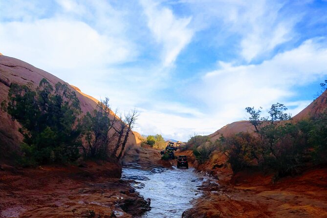 BEST! Hell's Revenge U-Drive 4X4 Tour in Moab +Dinosaur Tracks! - On trail at Hell’s Revenge: rocks, red sandstone, and dinosaur tracks
