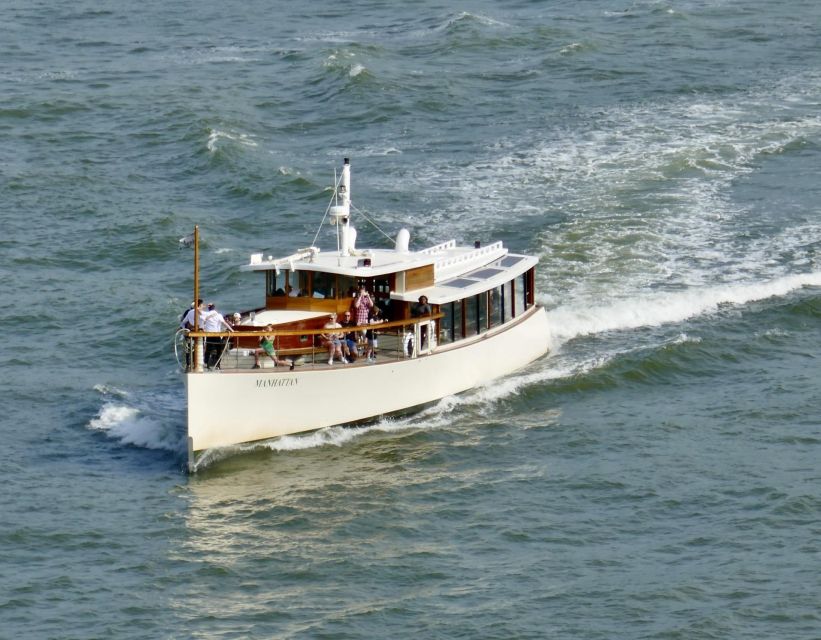 Boston: Harbor Sunset Yacht Cruise - Where to stand: top deck vs cabin when the air turns chilly
