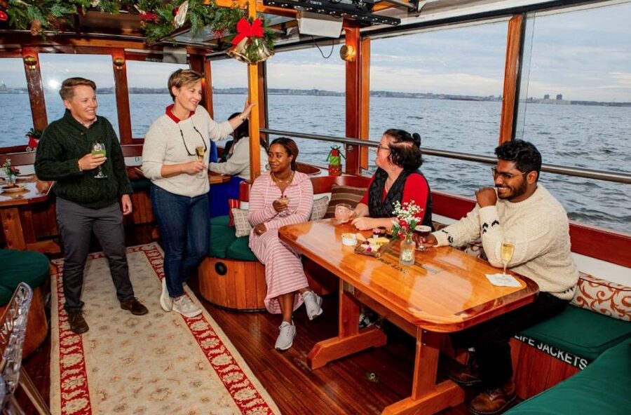 Boston: Harbor Sunset Yacht Cruise - Inside the yacht: 1920s-style comfort, six bathrooms, and space to breathe
