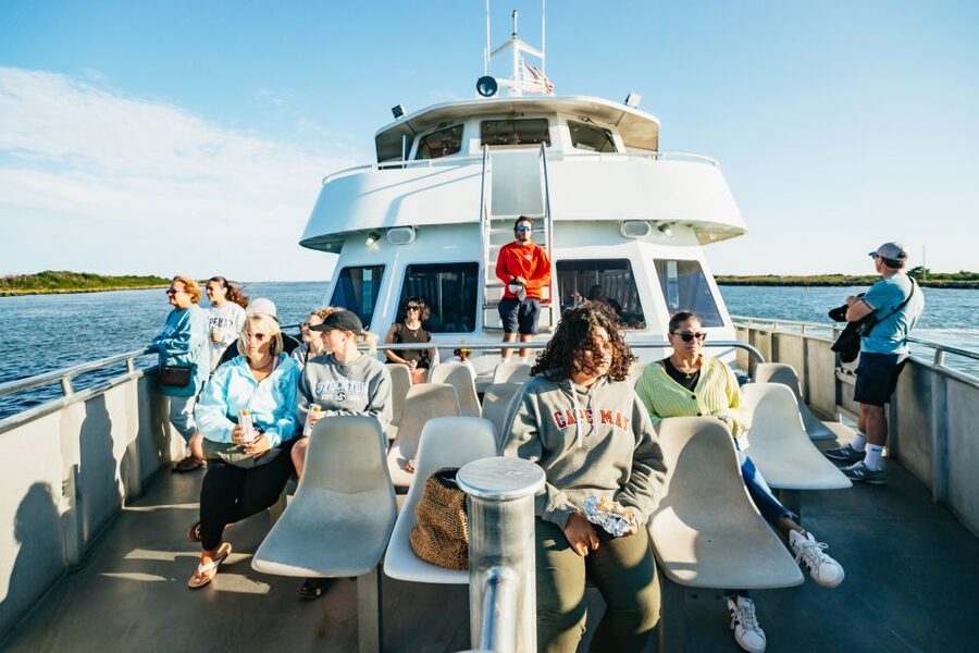 Cape May: Cape May Island Sunset Cruise & Dolphin Watching - Boarding the Cape May Whale Watcher at Miss Chris Marina