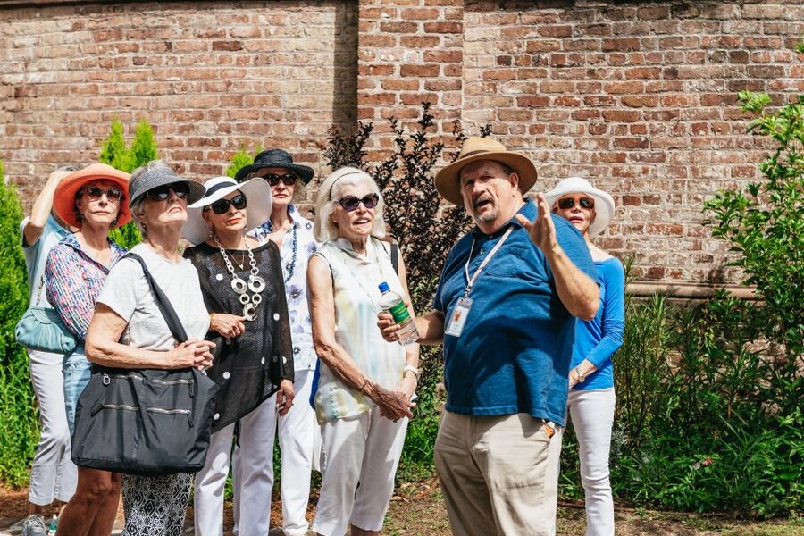 Charleston: Old Walled City Historical Walking Tour - French Quarter to Dock Street Theatre, the first stretch with real street context