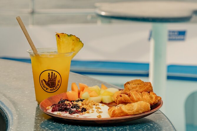 Deluxe Snorkel & Dolphin Watch Aboard a Luxury Catamaran from Kailua-Kona - Boarding day: what the boat feels like and what’s included