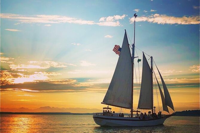 Evening Colors Sunset Sail Tour in Seattle - Hoisting the sails: the hands-on moment that most people remember