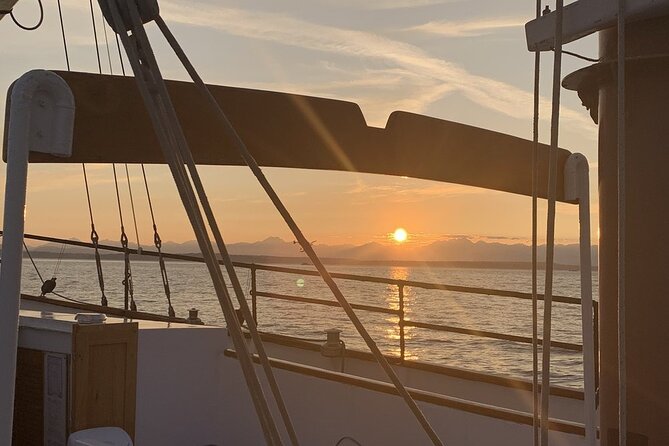 Evening Colors Sunset Sail Tour in Seattle - Sunset calm: when the engine cuts and the mood changes