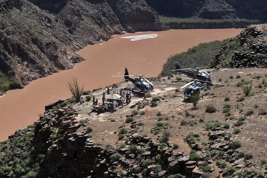 From Las Vegas: Grand Canyon Skywalk Express Helicopter Tour - Walking the glass bridge: fear of heights, phone rules, and picture strategy