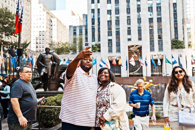 Half-Day Bus Tour of NYC Top Highlights - Midtown drive-by stories: 6th Avenue, Central Park, Lincoln Center, and the Dakota