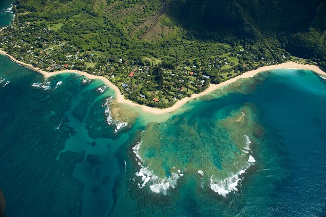 Kauai Airplane Tour: Na Pali Coast, Waterfalls & Window Seats - Wailua Falls and Fantasy Island views: a waterfall you recognize fast