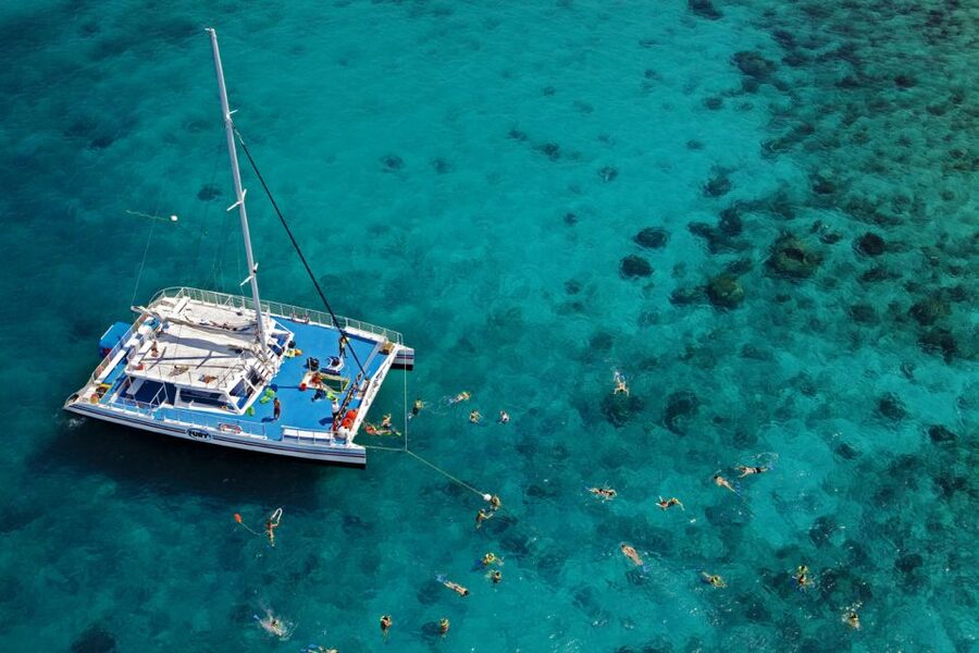 Key West: Reef Snorkeling with Drinks and Sunset Option - Boarding the 65-Foot Catamaran: Space, Shade, and the Crew Vibe
