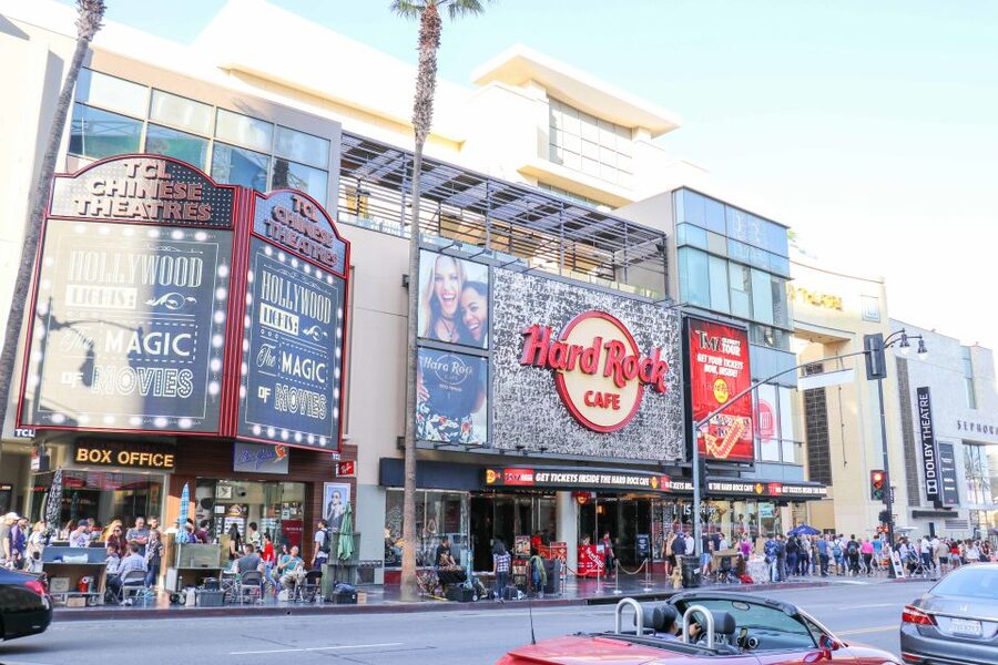 Los Angeles: Hollywood & Celebrity Homes Open-Air Bus Tour - Sunset Boulevard energy: Whiskey a Go Go, Rainbow Bar & Grill, and comedy stops