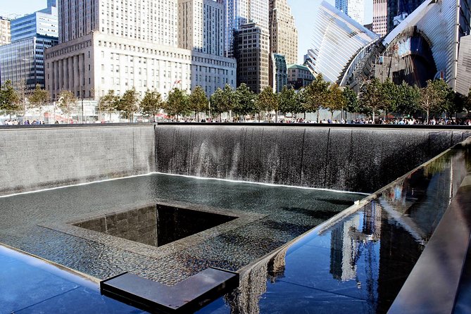 NYC City Tour: Statue of Liberty, 9/11 Memorial, Wall Street - Battery Park, Castle Clinton, and the Canyon of Heroes Story