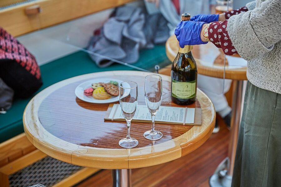 NYC: Holiday Yacht Cruise with Jazz, Cocoa & Carols - Onboard comfort: heated cabins, assigned seating, and photo-friendly deck time