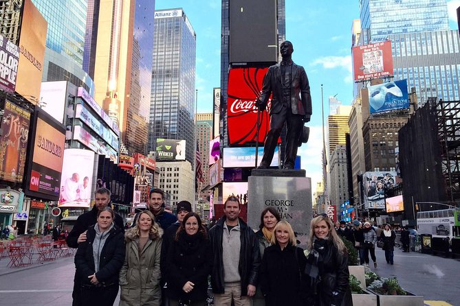NYC in a Day Tour: Lady Liberty, Times Square, Freedom Tower - Wall Street Icons, Charging Bull Photos, and the Ferry Bridge Moment