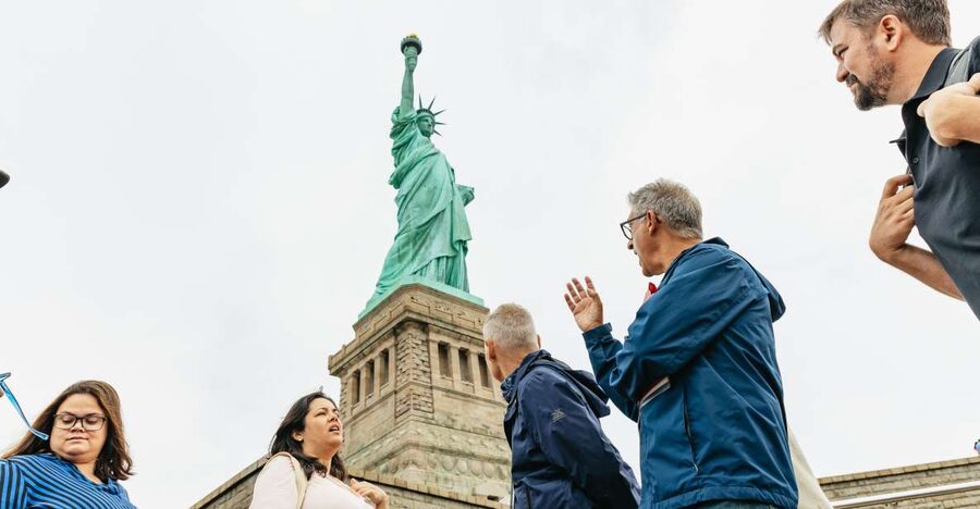 NYC: Statue of Liberty and Ellis Island Guided Tour - Liberty Island ferry ride: the skyline photos come early