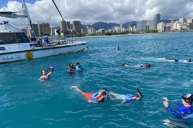 Oahu Catamaran Snorkel Tour: See Turtles 100% Guaranteed - Turtle-focused catamaran time in Waikiki