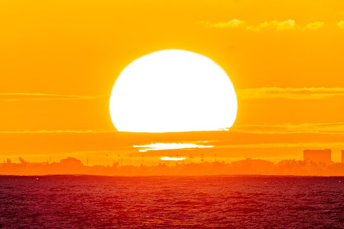 Oahu's Waikiki Coast: Moana’s Sunset Cocktail Sail - Photos that actually work: where the light and the boat angle help