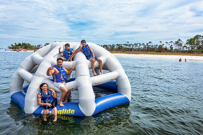 Shell Island Inflatable Adventure Park & Dolphin Sightseeing Tour - Dolphin spotting: the hunt through Grand Lagoon