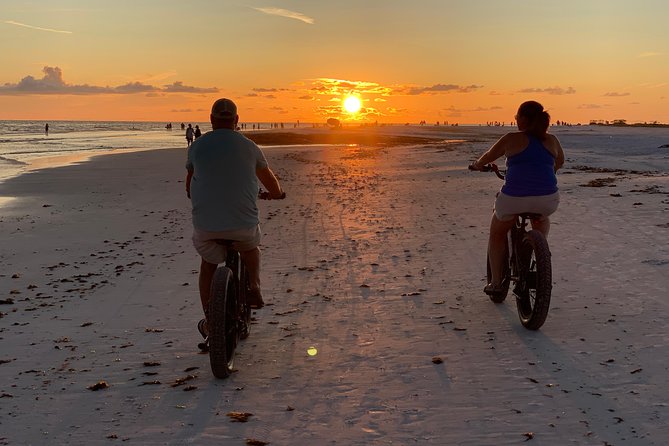 Siesta Key Electric Bike Sunset Tour - Getting on the bike fast at Old Stickney Point Road