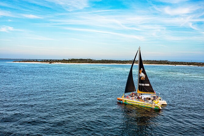 Sunset Dolphin Sail Aboard the Privateer Catamaran - Why a Privateer sunset dolphin sail works so well in Panama City Beach