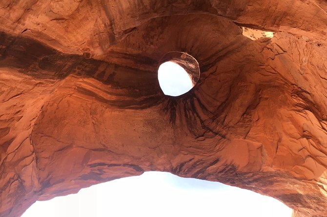 Sunset Tour of Monument Valley - Photo strategy for mitten shadows, arches, and dust