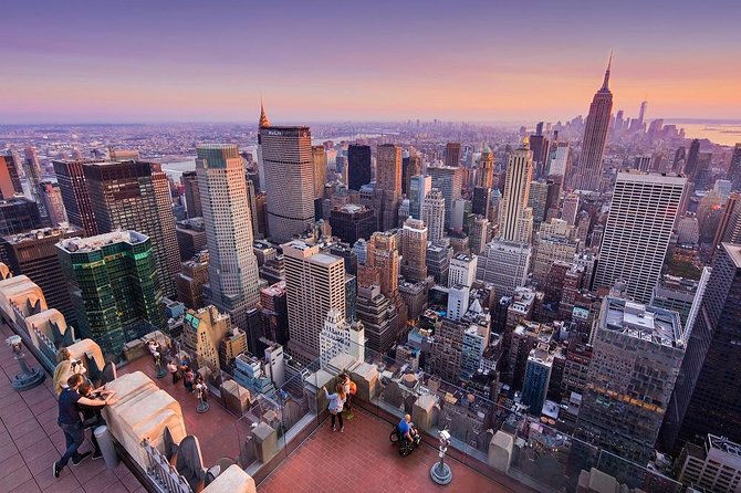 Top of the Rock Observation Deck New York City Ticket - The Beam Experience upgrade: the iconic photo moment, with real tradeoffs
