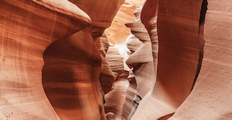 Vegas: Antelope Canyon & Horseshoe Bend Tour at Golden Hour - Lower Antelope Canyon and the Navajo guide effect